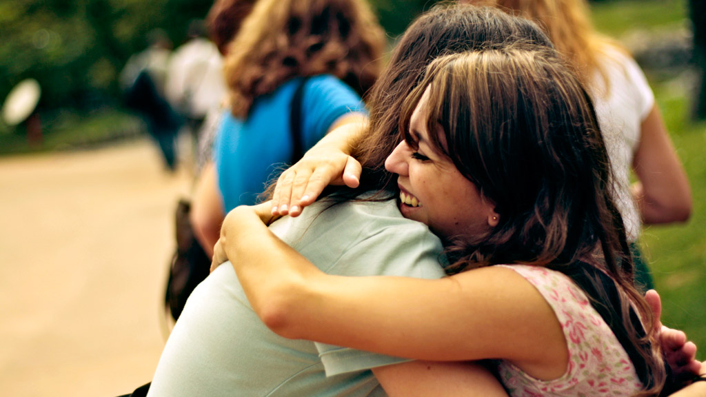 Women hugging